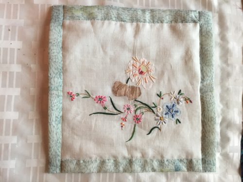 My first QAYG block using the beautiful embroidery I saved from a old table cloth . 